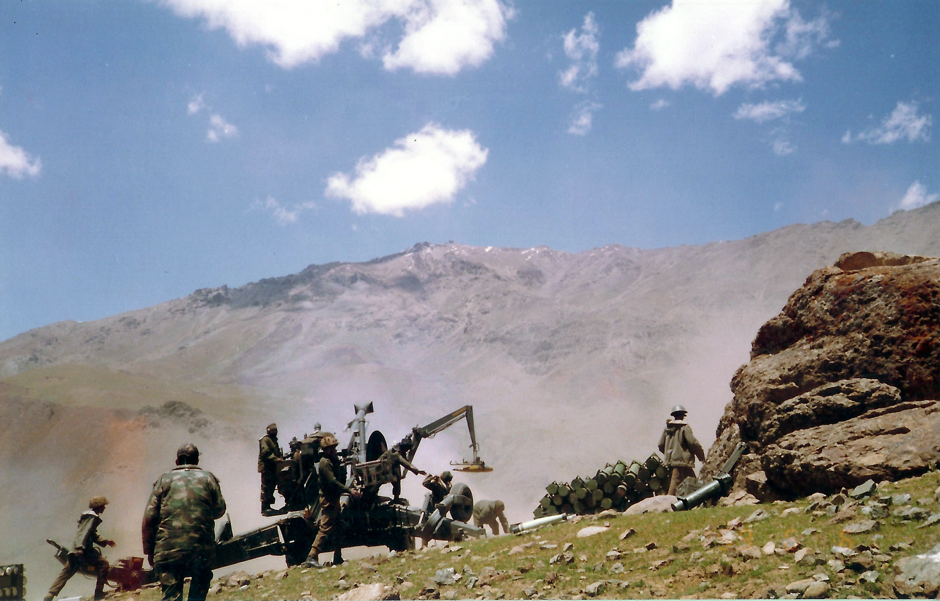 Indian artillery in action in the mountains during the Kargil War